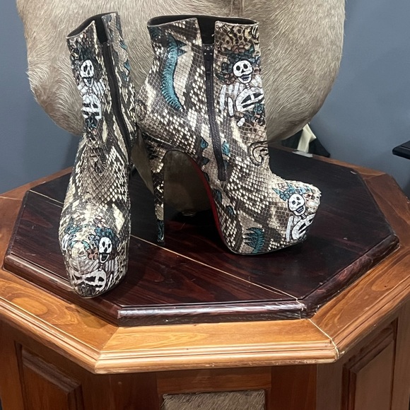 I’m selling a pair of Christian Louboutin snake skin multi colored bootie - Picture 3 of 3